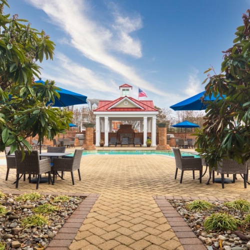 Find your perfect fit at Watermark at Talbot Park a courtyard with tables and chairs