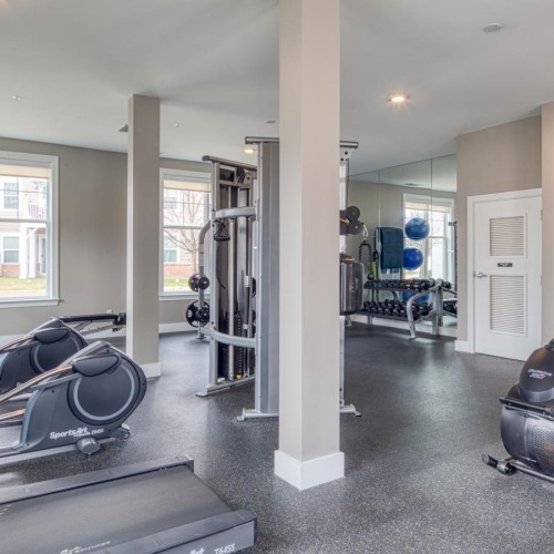Cutting-edge amenities at your fingertips a room with treadmills