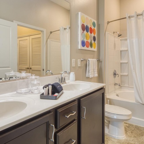 Spacious bathrooms with everything you need a bathroom with a tub sink and toilet